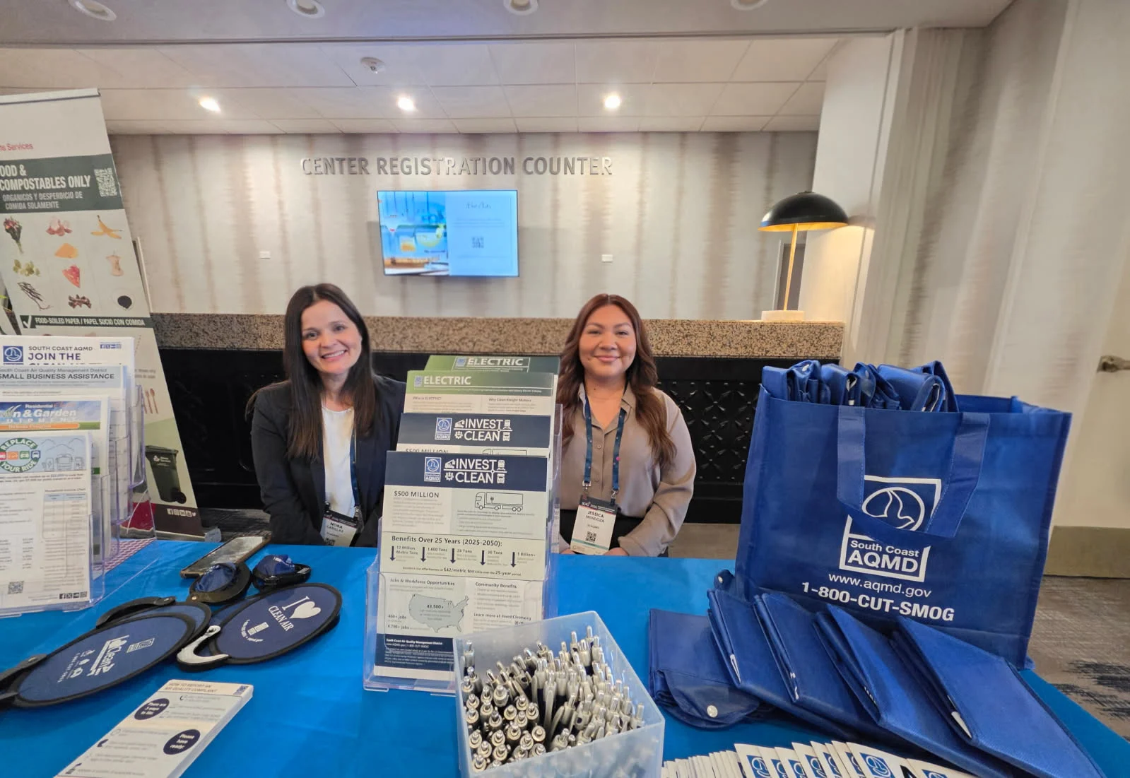 South Coast AQMD staff and attendees at an indoor outreach event